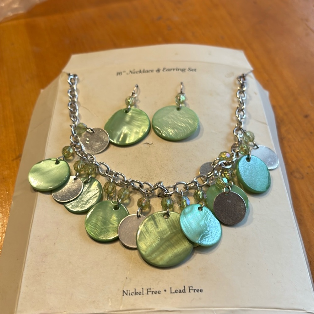 Beautiful lime green shell with silver in between